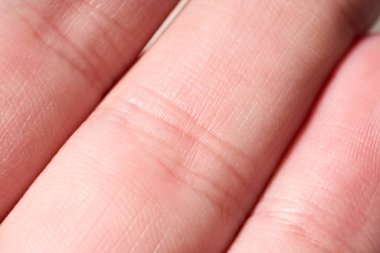 Pembe deri dokusunun arka planı. Sağlıklı cilt. Deri hücrelerinin makro fotoğrafı.