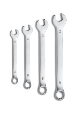 İngiliz anahtarı beyazda izole. Spanners. Bir sürü anahtar. Endüstriyel geçmiş. İngiliz anahtarı alet takımı. Farklı boyutlarda anahtarlar..