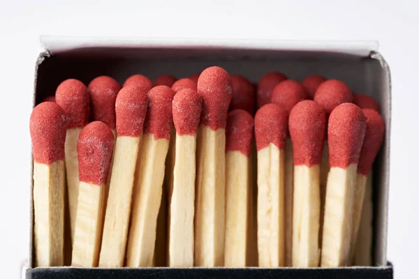 Burnt matches isolated on white. Box of matches. Different stages of match burning Burnt matches.