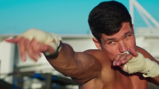Attractive Young Man Practices Shadow Boxing Onboard Cruise Ship — Vídeo de stock
