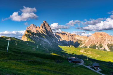 Seceda peak. Trentino Alto Adige, Dolomites Alps, South Tyrol, Italy. Odle mountain range, Val Gardena. Majestic Furchetta peak. Odles group seen from Seceda, Santa Cristina Val Gardena.