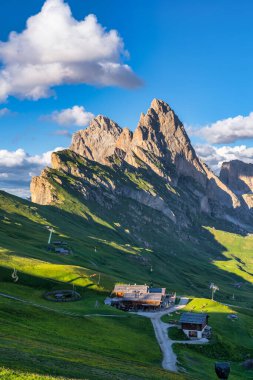Seceda peak. Trentino Alto Adige, Dolomites Alps, South Tyrol, Italy. Odle mountain range, Val Gardena. Majestic Furchetta peak. Odles group seen from Seceda, Santa Cristina Val Gardena.