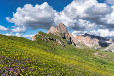 Seceda peak. Trentino Alto Adige, Dolomites Alps, South Tyrol, Italy. Odle mountain range, Val Gardena. Majestic Furchetta peak. Odles group seen from Seceda, Santa Cristina Val Gardena.