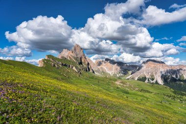 Seceda peak. Trentino Alto Adige, Dolomites Alps, South Tyrol, Italy. Odle mountain range, Val Gardena. Majestic Furchetta peak. Odles group seen from Seceda, Santa Cristina Val Gardena.