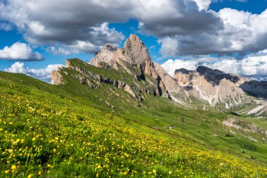 Seceda peak. Trentino Alto Adige, Dolomites Alps, South Tyrol, Italy. Odle mountain range, Val Gardena. Majestic Furchetta peak. Odles group seen from Seceda, Santa Cristina Val Gardena.