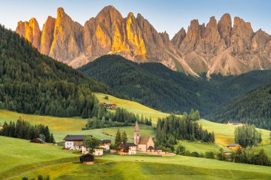 Sunrise Scene of Landscape with the Santa Maddalena church and the Dolomites in the Funes valley, South Tyrol, Italy