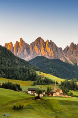 Sunrise Scene of Landscape with the Santa Maddalena church and the Dolomites in the Funes valley, South Tyrol, Italy