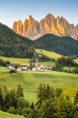 Sunrise Scene of Landscape with the Santa Maddalena church and the Dolomites in the Funes valley, South Tyrol, Italy