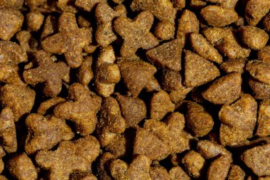 Köpek ya da kedi maması ya da köpek maması yakından çekilmiş. Üst görünüm arkaplanı. 