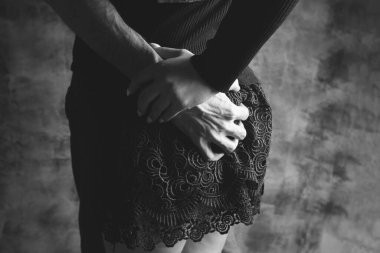 a man holding a woman by the ass