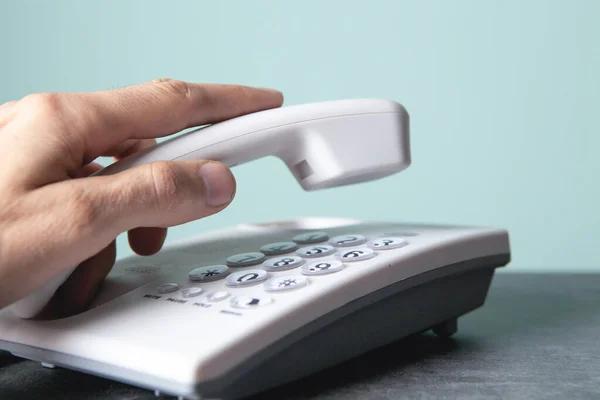 Man Holding Home Phone — Stock Photo, Image