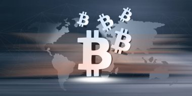 Dünya haritasının arka planında bitcoin simgeleri