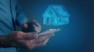 Telefondaki adam ev simgesine tıklıyor