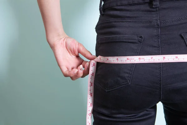 Woman Measures Her Butt Measuring Tape — 图库照片