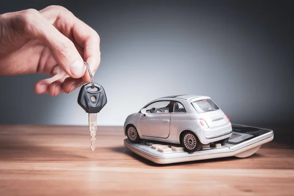 car costs and financing; Car keys, car and calculator