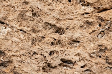 Farklı tonlarda gri bir arkaplan olarak kaya