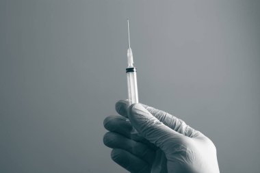 Tıbbi eldiven mavi kalıp aşısı şişesi