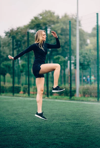 Woman is doing workout. — Stock Photo, Image