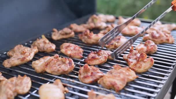 Meat Grilled Cook Flips Fried Chicken Fillet Tongs Close — Stockvideo