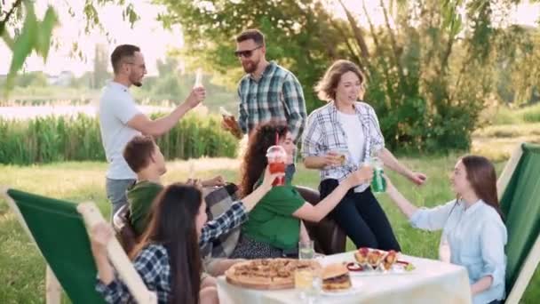 Group Friends Relaxing Together Outdoor Young Cheerful People Clink Glasses — Stock Video
