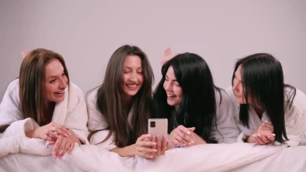 Girlfriends Have Fun Chatting Together Young Attractive Females Lying Bed — Video