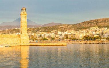 Rethymno, Greece island Crete, Peaceful landscape on the bay before sunset view of the lighthouse and the waterfront 