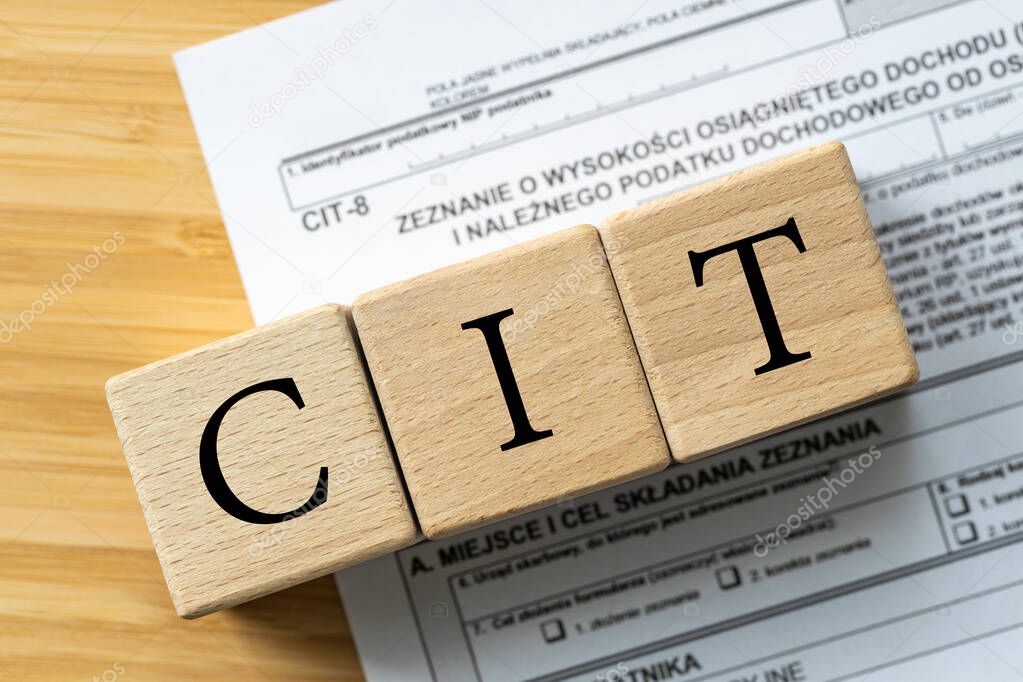 tax settlements for companies in Poland, Forms for business entities, Wooden blocks with the inscription CIT, Tax concept for enterprises 