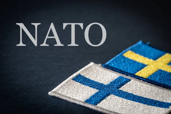 May 2022, Flags of Finland and Sweden Next to the inscription NATO, Concept of the accession of both Scandinavian countries to join the ranks of the North Atlantic alliance