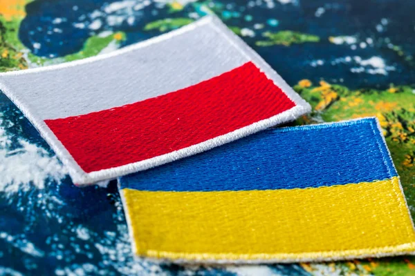 Die Flagge Der Ukraine Und Polens Das Konzept Der Zusammenarbeit lizenzfreie Stockbilder