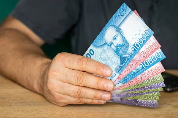 Chile Pesos Currency Man Shirt Holds Spread Out Money His — Fotografia de Stock