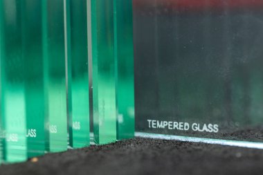 Tempered glass, inscription burned on thick glass to protect the material from breaking, Construction industry