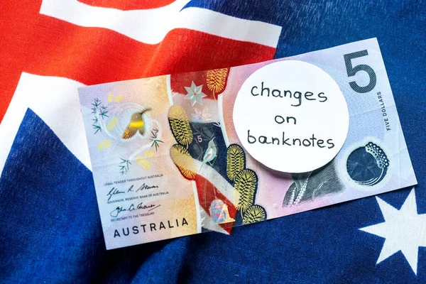 5 Australian dollar banknote with the veiled face of the English queen and handwritten inscription, Changes on banknotes, Australia, Concept of exchange and placing the face of the new monarch on money