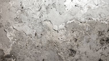 Doku, duvar, beton, arka plan olarak kullanılabilir. Çimento ve beton dokunun desen ve arkaplanı üzerinde çizikler ve çatlaklar olan duvar parçası.