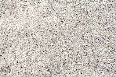 Doku, duvar, beton, arka plan olarak kullanılabilir. Çimento ve beton dokunun desen ve arkaplanı üzerinde çizikler ve çatlaklar olan duvar parçası.