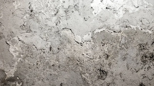 Doku, duvar, beton, arka plan olarak kullanılabilir. Çimento ve beton dokunun desen ve arkaplanı üzerinde çizikler ve çatlaklar olan duvar parçası.