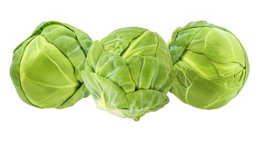 Beyaz arka planda taze Brüksel lahanası.