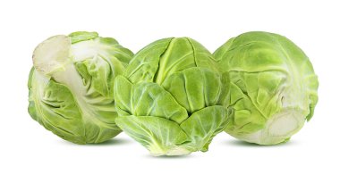 Beyaz arka planda taze Brüksel lahanası.