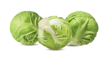 Beyaz arka planda taze Brüksel lahanası.