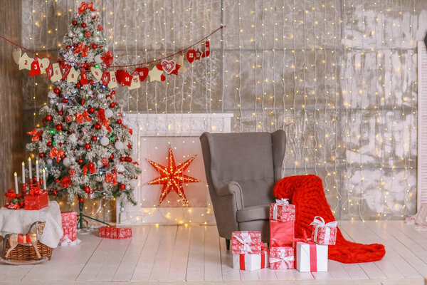 Christmas decorations in red and white. Hearts, boxes and garlands