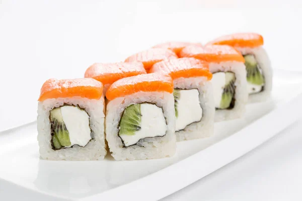 Japanese food, tasty of meal for lunch. Seafood. Philadelphia roll, salmon, soft cheese and kiwi — Stock Photo, Image
