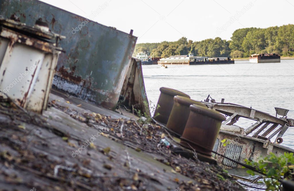 Stranded Old abandoned tanker wreck on the banksof the Danube River in Novi Sad.