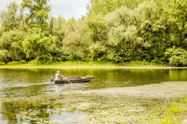 Sport Fisherman Rides Pond Wooden Boat Help Oar — Stok fotoğraf