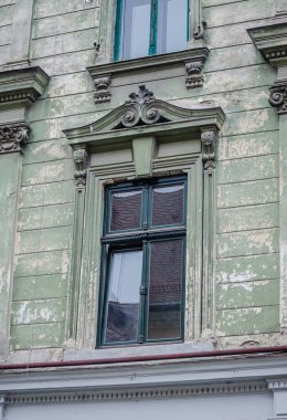 Timisoara, Romania - October 29, 2016: Windows with decorative baroque facades in the center of Timisoara, Romania