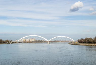Novi Sad, Serbia. May - 02. 2021. Zezelj bridge on river Danube in Novi Sad from the Petrovaradin side. View of the Zezelje Bridge on the Danube in Novi Sad from the Petrovaradin side in the summer and in the afternoon.