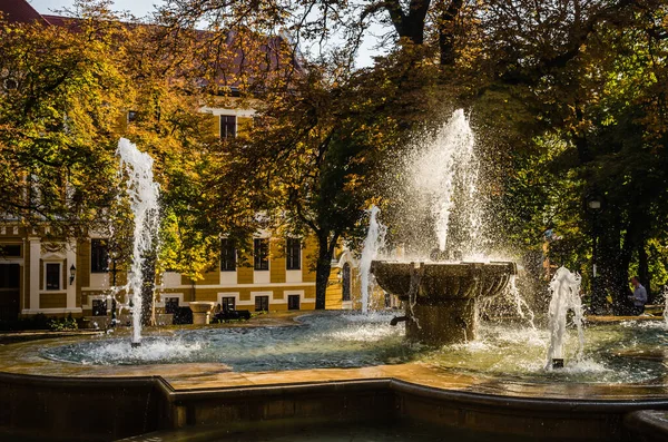 Pecs, Hungary - October 06, 2018: The fountain in the city park Pecs, Hungary, in the fall.