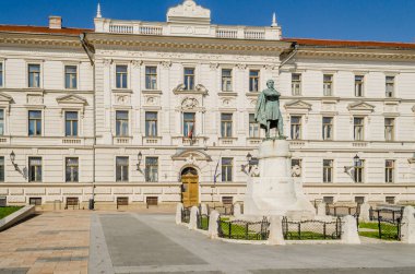 Pecs, Hungary - October 06, 2018: Statue Of Lajos Kossuth And Governmental Building In Pecs, Hungary.