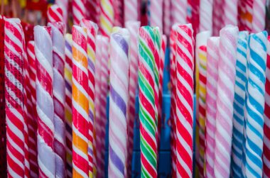 Sweet and sugar colorful candies in the shop for background.