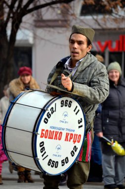 Novi Sad, Serbia - December 31, 2012: Trumpeters in the city before the new year. Trumpeters in the city before the New Year entertain their fellow citizens with their music.