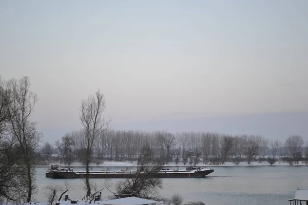 Panoramic view of the Danube River. A panoramic view of the Danube River and the crashed tanker in the frozen water.