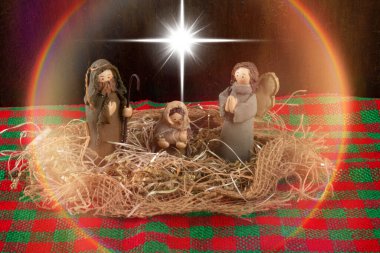 Geleneksel Noel süsü. Doğum sahnesi. Kırsal arkaplan. 